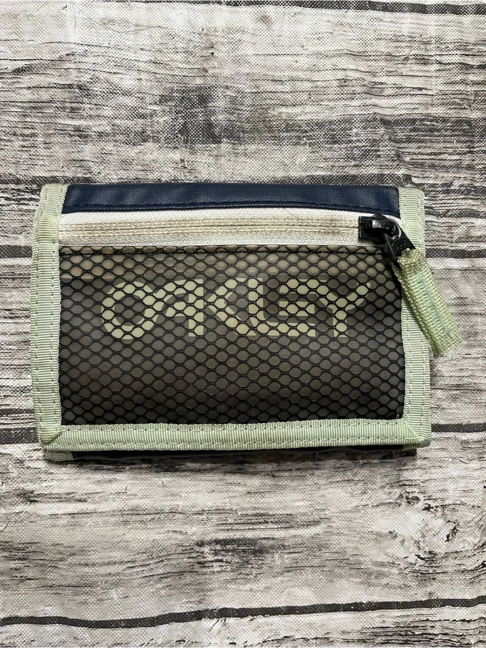 Oakley 90's Wallet mesh exterior panel & retro branding good condition mild disc